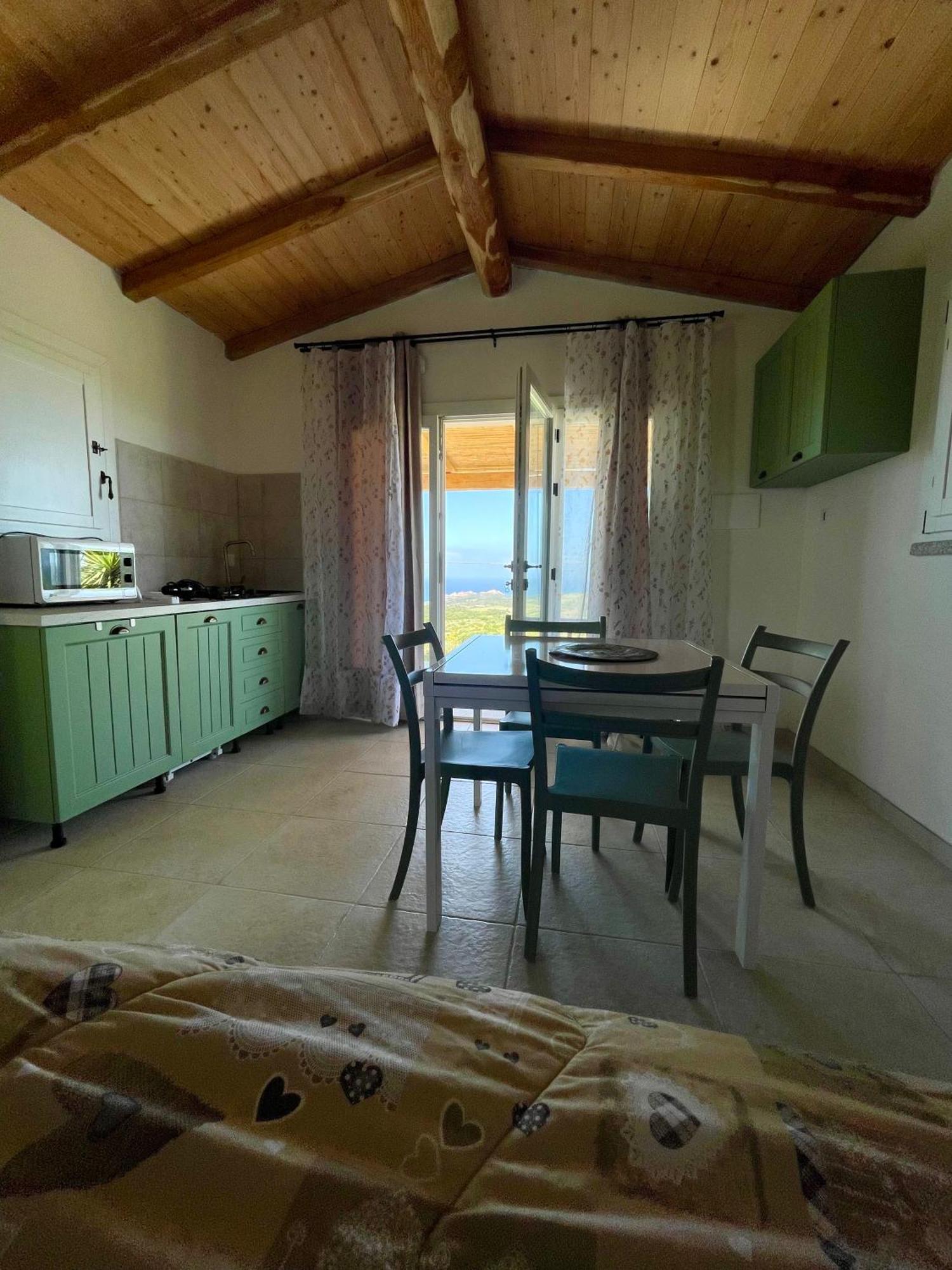 Isola Rossa Appartamenti Paduledda Bagian luar foto