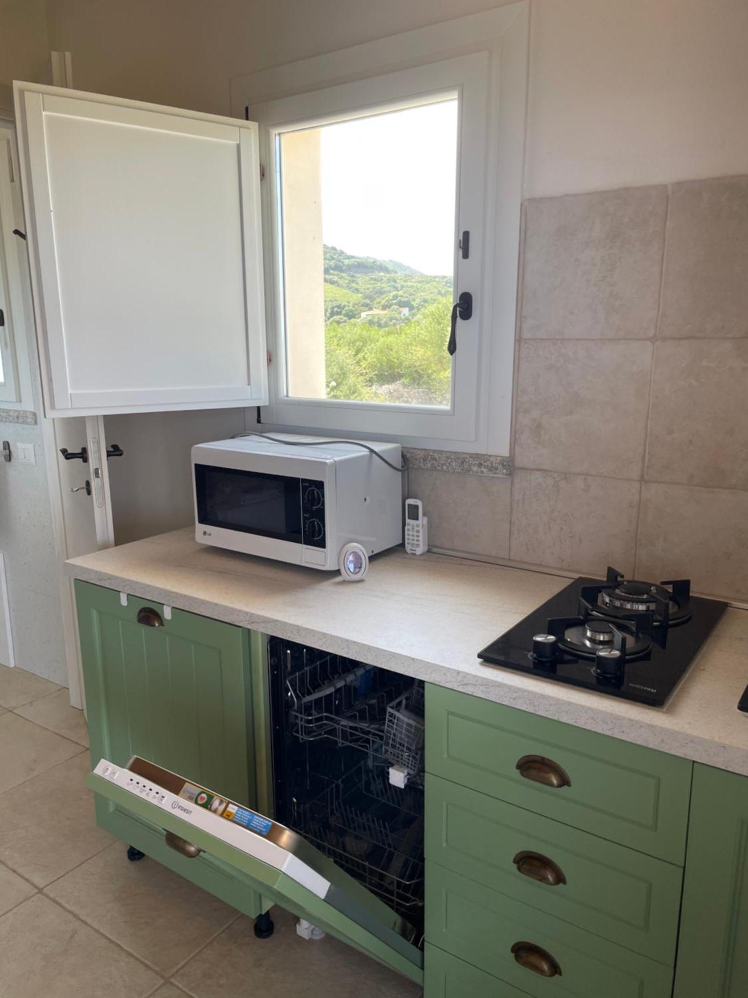 Isola Rossa Appartamenti Paduledda Bagian luar foto
